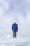 A man doing solo outdoor activity, enjoying time alone in nature, walking on frozen lake in winter