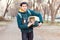 Man with domestic cat in a pet carrier