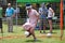 Man Dressed As Queen Elizabeth Plays Soccer Goalie At Festival