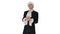 Man dressed in courtier frock coat and white wig thinking and fi