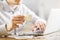 Man drinking coffee using laptop