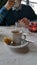 Man drinking expresso coffee in restaurant