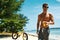 Man Drinking Juice Smoothie Cocktail On Summer Beach. Vacation