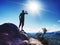 Man drinking water from plastic bottle in beautiful mountains