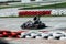 Man drive go kart on track