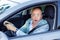 Man driving a car shocked about to have traffic accident, windsh