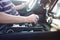 Man driving a car. Success in motion. Handsome young man driving a car. A man holds the steering wheel of a car