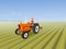 The man is driving a orange tractor. In order to plow the soil in the field