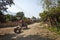 Man driving tractor, Vang Vieng