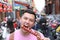 Man eating Bing Tanghulu Candied Hawthorn Stick