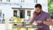 Man eating breakfast in cafe, slider and pan shot, right