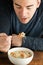 Man Eating Homemade Chicken Soup