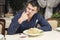 Man eating a large portion of pasta