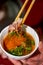 A man is eating old Beijing Shabu-shabu mutton, clipping mutton close-up