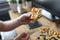 Man eating pizza at workplace close up