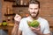 Man eating salad