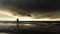 Man enjoying gloomy sunset at Gokarna beach, Karnataka