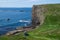 Man enjoying Picnic above Fingals Cave