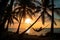 Man enjoying quiet moment in hammock on tropical beach. Generative AI