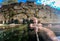 Man enjoying and relaxing in natural thermal water roman spa