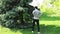 Man enjoying a sunny afternoon stroll in a lush green park