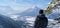 Man enjoys the view and looks down on Garmisch-Partenkirchen and Farchant