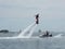 Man enjoys a water jet attachment to a jet ski in Nantucket