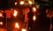 Man entertains the audience with the help of fire during the perehera in srilanka