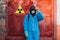 Man environment mask face radiation facemask icon protective overall blue orange rast factory disused catastrophe