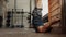 Man exercising at gymnastics wall bars in gym