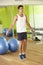 Man Exercising With Skipping Rope In Gym
