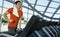 Man Exercising On Treadmill In Gym