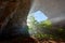 Man explores a cave. Cave Akmechet-Aulie. Turkestan region. Kazakhstan. Asia.