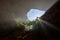 Man explores a cave. Cave Akmechet-Aulie. Turkestan region. Kazakhstan. Asia.