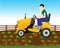 Man farmer on garden tractor in vegetable garden