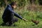 Man feeding weka bird, New Zealand flightless native bird