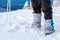 Man feet tourist protection trekking mountain snow winter sky blue equipment hiking