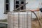 Man fills a plastic tank with water