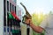 Man fills up his car with a gasoline at gas station. Petrol station pump. To fill car with fuel. Gasoline and oil products concept