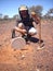 Man finding a small gold nugget