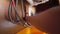 A man finishes assembling the plumbing and drainage system under the sink