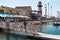 A Man Fishes in Oceanside Harbor Village in San Diego County