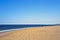 Man fishing at Atlantic Ocean shore at Sandy Hook