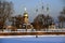 A man fishing on a frozen Neva river in historical city center of Saint-Petersburg