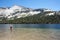 Man fishing in a lake in Yosemite