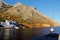 Man fishing at the port of Kamares, Sifnos island, Cyclades, Greece