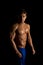 Man fitness no shirt on black side light look