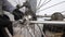 A man fixes the rear wheel on a mountain bike frame. Two keys. Bicycle repair. Close-up