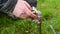 Man Fixing Garden Water Pipe