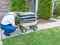 Man fixing a puncture on a wheelbarrow